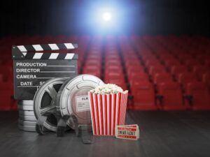 5 Massive Movies Shaking Up Cinemas This July cinema movie home video concept background film reels clapper board pop corn theater movie cinema screen with empty seats 505080 2198 1